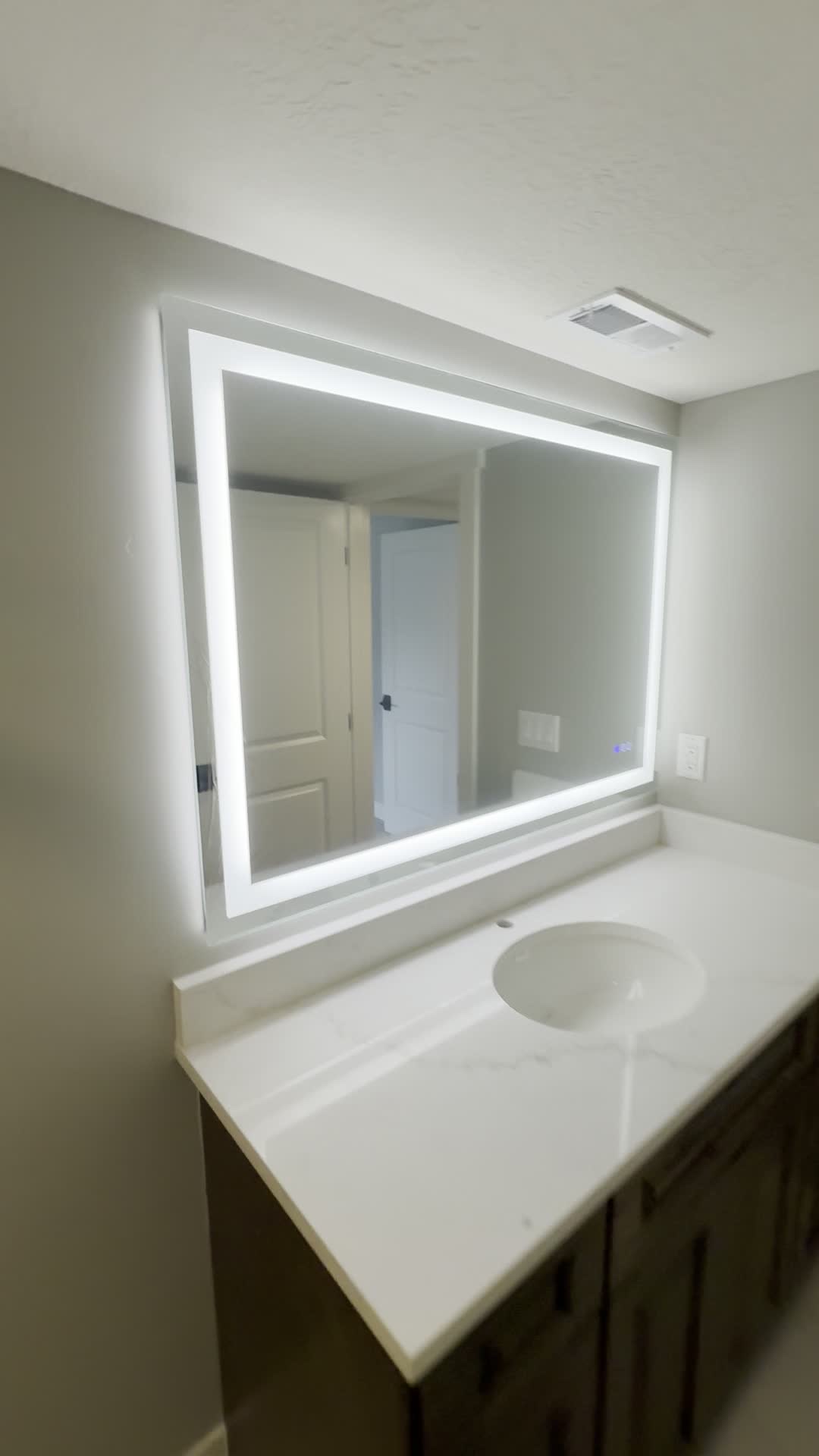 Clean bathroom remodel with tub, tile, and new vanity by Lynnwood Construction in Utah County