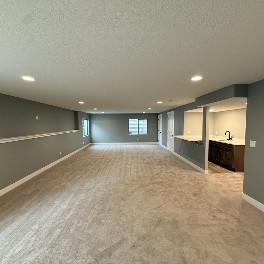 Finished basement living space by Lynnwood Construction in Utah County