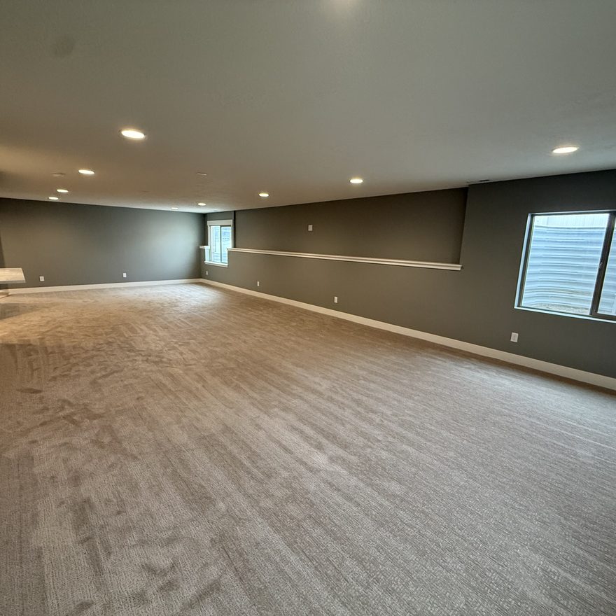 Finished basement rec room by Lynnwood Construction